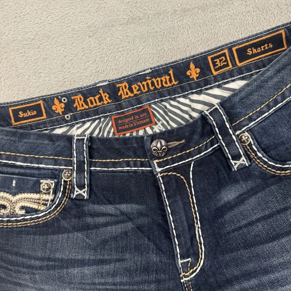 Rock Revival Sukie Shorts Women's 32 Cut Off Denim Fleur De Lis Button Pockets